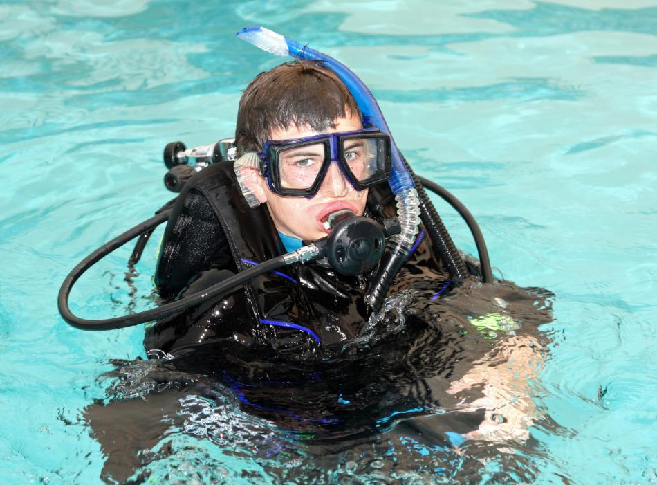 Young man in scuba attire